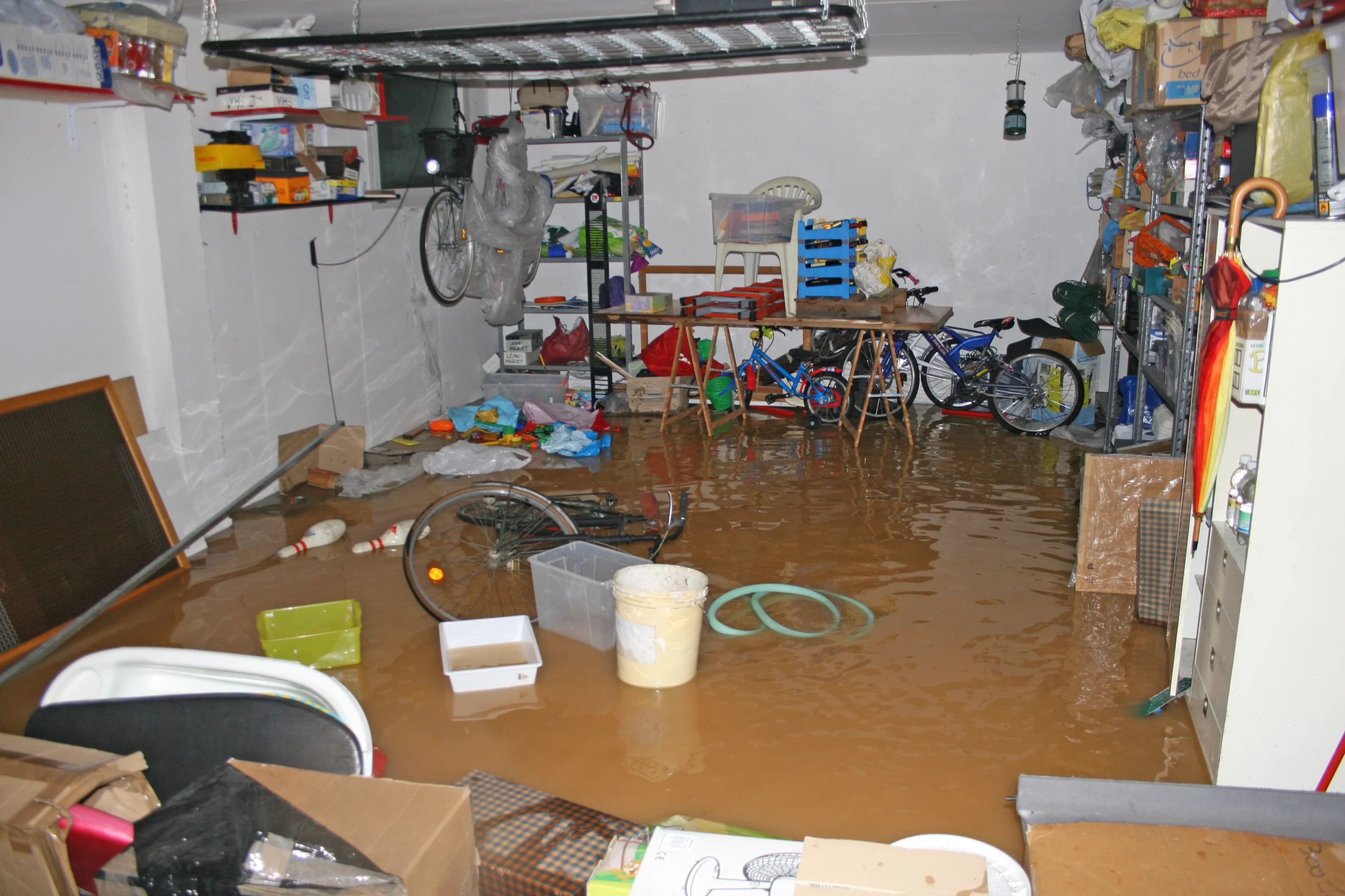 Woman Startled By Overflowing Bucket
