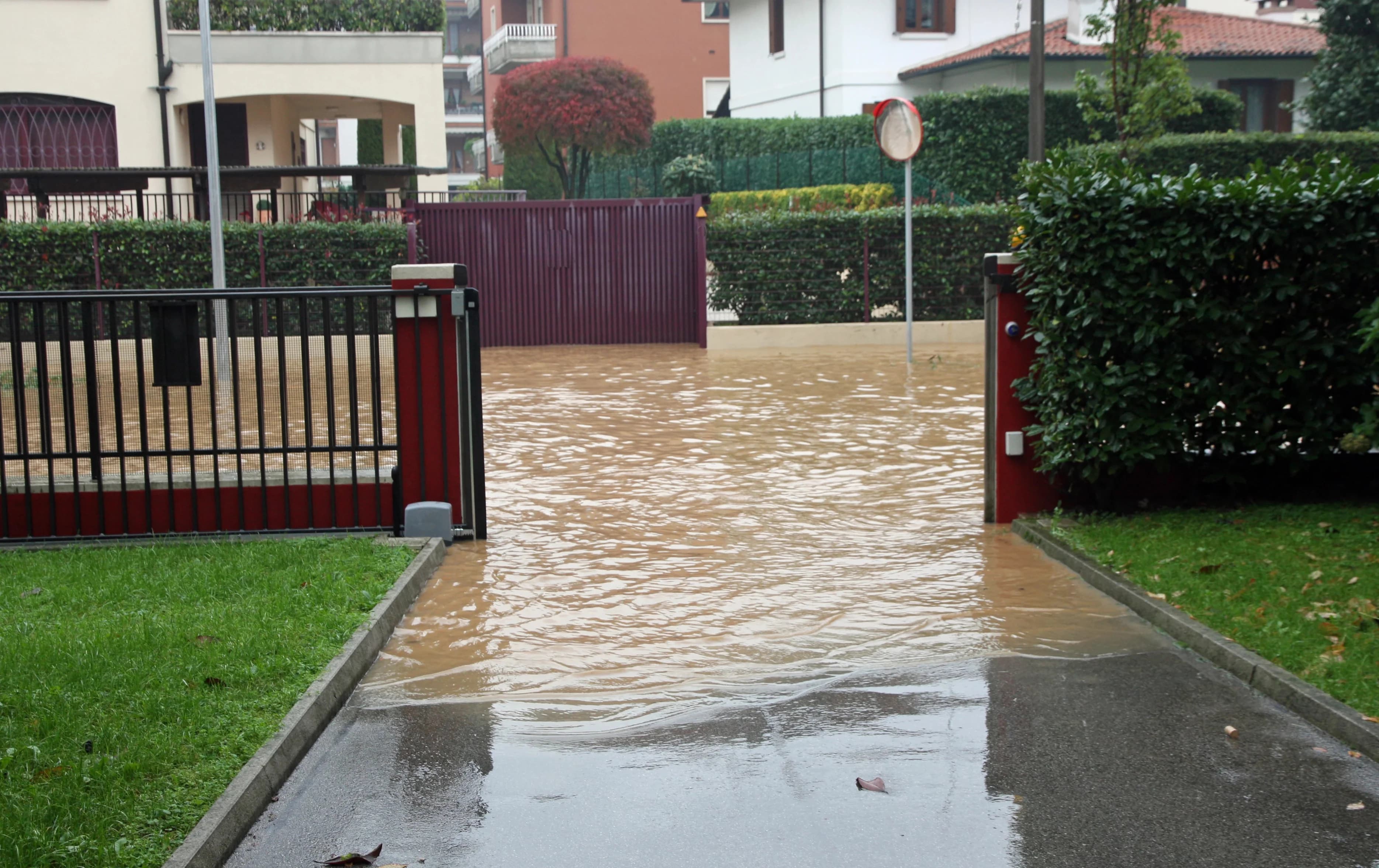 Floodwater Rushing Through Gate